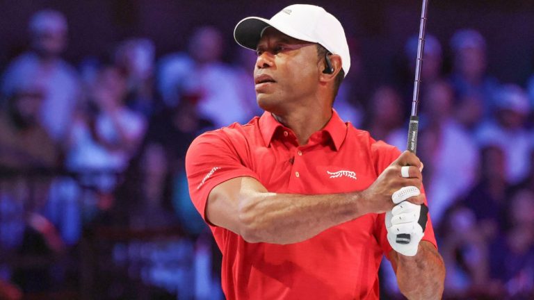 Tiger Woods of the Jupiter Links Golf Club plays his shot from the second tee the TGL finals golf tournament in Palm Beach Gardens, Fla., Tuesday, March 24, 2026. (Reinhold Matay/AP Photo)